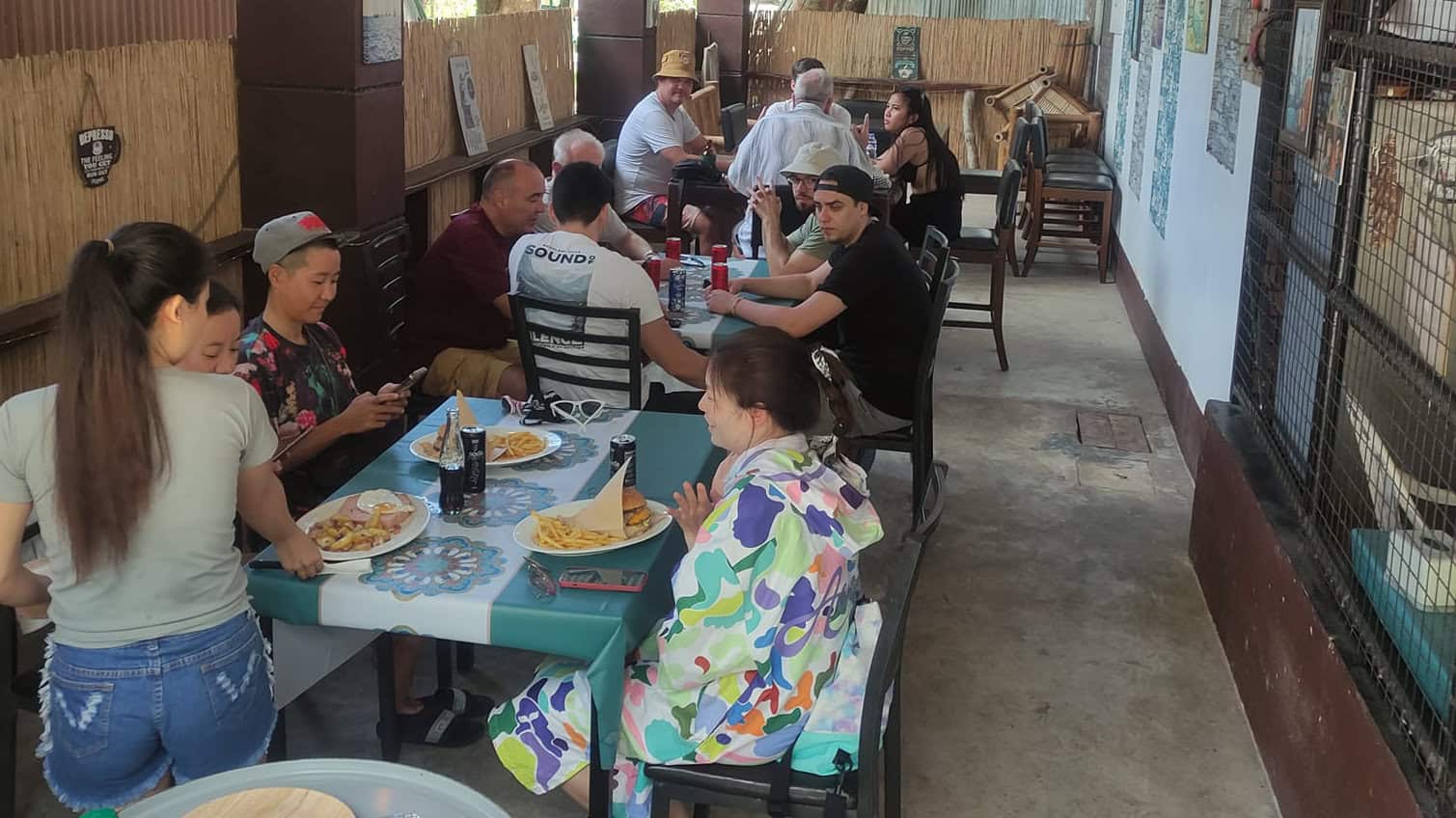 Guests enjoying a meal inside the ML Imbiss dining area